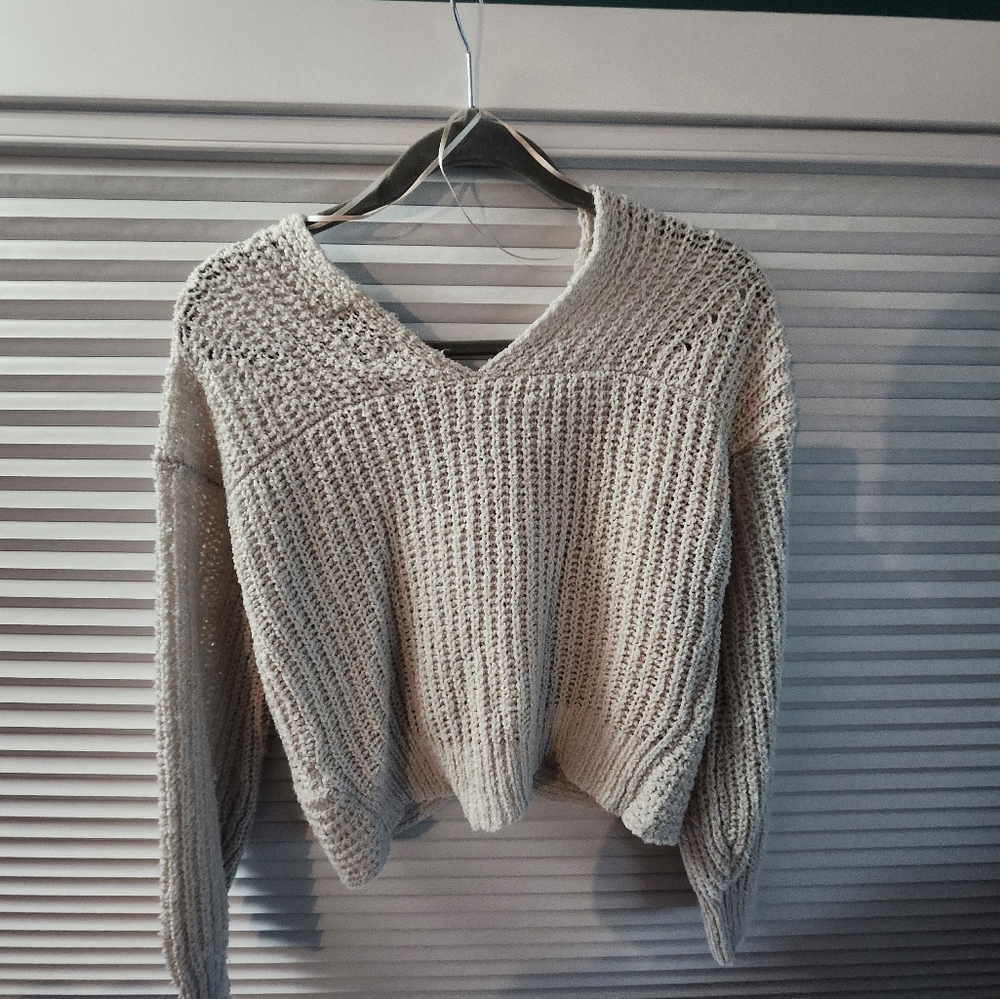 Cream sweater with cute twist back
